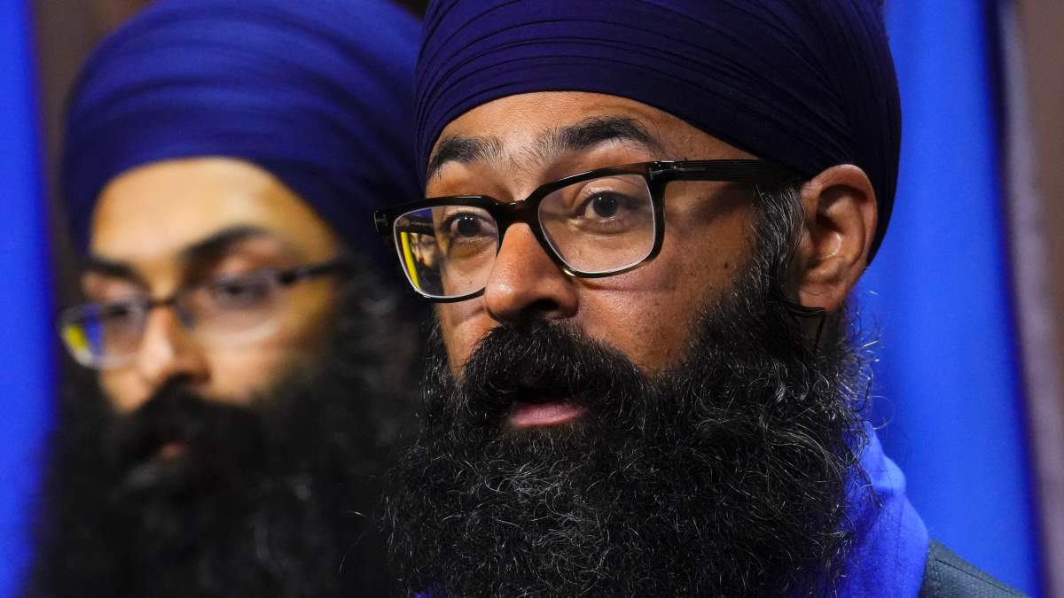 Moninder Singh, of the Sikh Federation Canada, right, on Parliament Hill, June 12, 2025. 